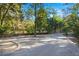 Gravel pathway with landscaping and trees at 122 Cainhoy Landing Rd, Charleston, SC 29492