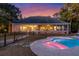 Luminous pool with spa at sunset at 122 Cainhoy Landing Rd, Charleston, SC 29492