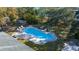 Freeform swimming pool with lounge chairs and waterfront views at 122 Cainhoy Landing Rd, Charleston, SC 29492