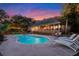 Relaxing pool and lounge chairs at sunset at 122 Cainhoy Landing Rd, Charleston, SC 29492