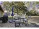 Backyard with patio furniture, grill, and large shade tree at 208 Janice St, Goose Creek, SC 29445