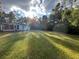 Spacious backyard with lush green grass at 211 Water Wheel Rd, Ridgeville, SC 29472