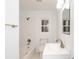 Clean bathroom featuring a bathtub, toilet, and vanity at 211 Water Wheel Rd, Ridgeville, SC 29472