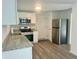 Modern kitchen with stainless steel appliances and granite countertops at 211 Water Wheel Rd, Ridgeville, SC 29472