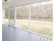 Spacious screened porch overlooking a wooded backyard at 211 Water Wheel Rd, Ridgeville, SC 29472