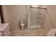 Basement bathroom with walk-in shower, toilet and vanity at 220 Thompson St, Walterboro, SC 29488