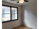 Bright bedroom with hardwood floors and large window at 220 Thompson St, Walterboro, SC 29488