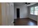 Spacious bedroom with hardwood floors and an ensuite bathroom at 220 Thompson St, Walterboro, SC 29488