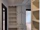 Built-in shelving units and cabinets in hallway at 220 Thompson St, Walterboro, SC 29488