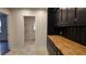 Butcher block countertops, stainless steel appliances, and ample cabinetry at 220 Thompson St, Walterboro, SC 29488