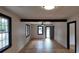 Bright living room featuring hardwood floors and an open floor plan at 220 Thompson St, Walterboro, SC 29488
