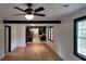 Hardwood floors and an open concept living area with kitchen view at 220 Thompson St, Walterboro, SC 29488
