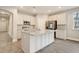 Modern kitchen with an island, stainless steel appliances, and light cabinets at 244 Mcmakin Dr, Summerville, SC 29483