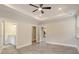 Bright main bedroom with wood-look floors and access to the bathroom at 244 Mcmakin Dr, Summerville, SC 29483