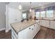 White kitchen with granite countertops and island, stainless steel appliances at 443 Switchgrass Dr, Summerville, SC 29486