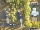 Aerial view of a residential neighborhood with houses and tree-lined streets at 119 Osage Way, Summerville, SC 29483