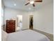 Bedroom with ceiling fan, dresser, and access to bathroom and closet at 119 Osage Way, Summerville, SC 29483