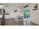 Bright eat-in kitchen with granite countertops, stainless steel appliances, and access to backyard at 119 Osage Way, Summerville, SC 29483