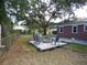 Large backyard with fire pit and seating area at 1278 S Lenevar Dr, Charleston, SC 29407