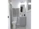 Small bathroom with gray vanity and marble-look flooring at 1278 S Lenevar Dr, Charleston, SC 29407
