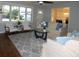 Spacious living room, hardwood floors, and ample natural light at 1278 S Lenevar Dr, Charleston, SC 29407