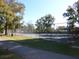 Tennis court with chain link fence at 1278 S Lenevar Dr, Charleston, SC 29407