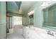 Bathroom with double vanity and corner tub at 1441 Waterside Ct, Mount Pleasant, SC 29464