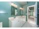 Double vanity bathroom with access to bedroom at 1441 Waterside Ct, Mount Pleasant, SC 29464