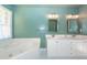 Bathroom with double vanity, soaking tub, and separate shower at 1441 Waterside Ct, Mount Pleasant, SC 29464