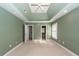 Primary bedroom with high ceilings and carpet at 1441 Waterside Ct, Mount Pleasant, SC 29464