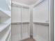 Walk-in closet with shelving and hanging rods at 1441 Waterside Ct, Mount Pleasant, SC 29464