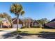 Brick home with two-car garage and manicured lawn at 1441 Waterside Ct, Mount Pleasant, SC 29464