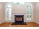 Fireplace with a black hearth and white mantel at 1441 Waterside Ct, Mount Pleasant, SC 29464