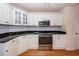 Modern kitchen with stainless steel appliances and white cabinets at 1441 Waterside Ct, Mount Pleasant, SC 29464