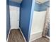 Clean bathroom with a tub, shower, and updated flooring at 148 Pine Shadow Dr, Goose Creek, SC 29445