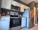 Stainless steel appliances and light blue cabinets in kitchen at 148 Pine Shadow Dr, Goose Creek, SC 29445