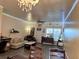 Living room with hardwood floors, comfy seating and decorative lighting at 148 Pine Shadow Dr, Goose Creek, SC 29445