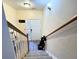 Staircase with light wood railing leading to the second floor at 148 Pine Shadow Dr, Goose Creek, SC 29445