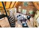 High-ceilinged living room with spiral staircase and hardwood floors at 15717 Round O Rd, Round O, SC 29474