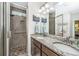 Double vanity bathroom with granite countertop and walk in shower at 160 Ashley Bluffs Rd, Summerville, SC 29485