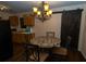 Small dining area with round table and four chairs at 1905 Central Park Rd # B, Charleston, SC 29412