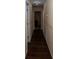Long hallway with dark wood floors at 1905 Central Park Rd # B, Charleston, SC 29412
