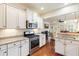 Kitchen with white cabinets, granite countertops, and stainless steel appliances at 1944 Gracewood Dr, Charleston, SC 29414