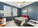 Cozy bedroom featuring a comfortable bed, ceiling fan, and neutral wall tones at 213 Oak View Way, Summerville, SC 29483