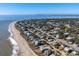 Coastal home nestled among trees near the beach on a sunny day at 2305 Myrtle St, Edisto Beach, SC 29438
