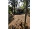Peaceful backyard setting with mature trees at 2305 Myrtle St, Edisto Beach, SC 29438