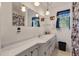 Clean bathroom featuring a white vanity, a patterned shower curtain, and a large mirror at 2305 Myrtle St, Edisto Beach, SC 29438