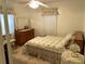 Bright bedroom with a double bed and wood dresser at 2305 Myrtle St, Edisto Beach, SC 29438