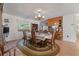 Dining room with table and chairs, a hutch, and a view into the kitchen at 2305 Myrtle St, Edisto Beach, SC 29438