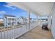 Relaxing porch with wooden floors and views of the neighborhood at 234 Bird Song Path, Summerville, SC 29485